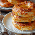 Easy Cottage Cheese Bagel Recipe Without Self Rising Flour 21 Cottage cheese bagels freshly baked and golden brown on a plate