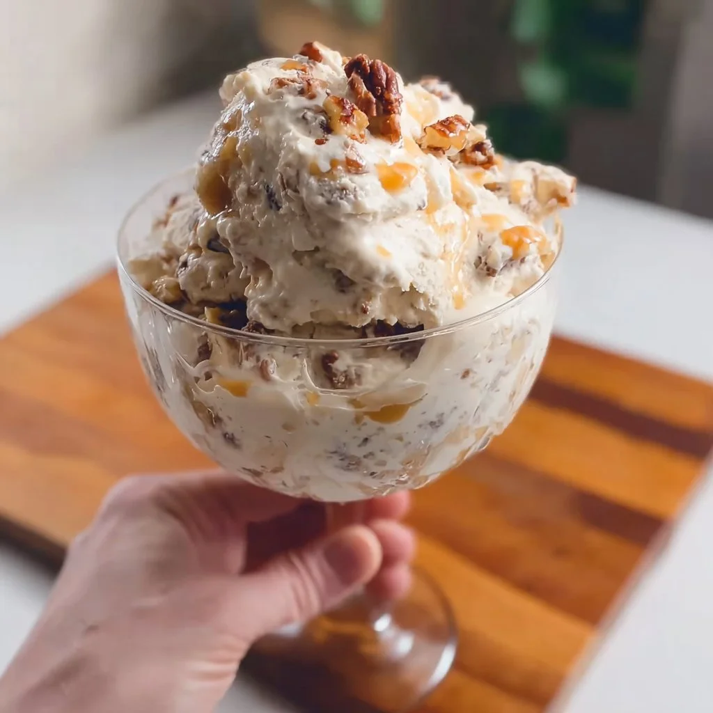 Delicious salted caramel cottage cheese ice cream in a bowl topped with caramel